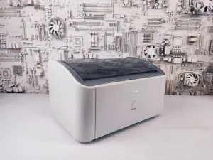  Canon LBP-2900,  703, 2000 .